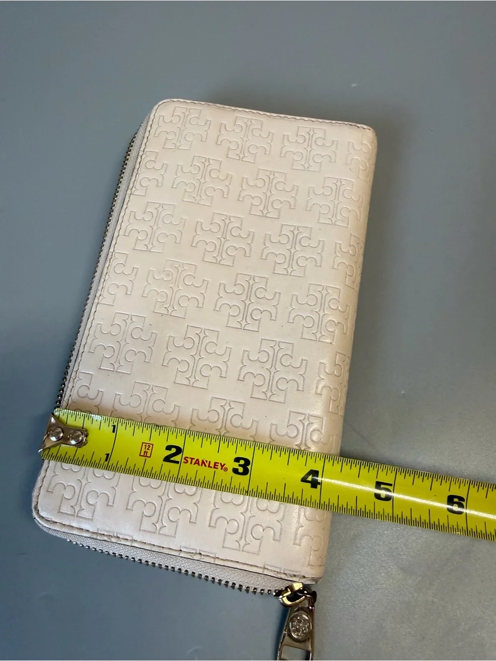 Tory Burch Leather Embossed Monogram zip wallet Off white